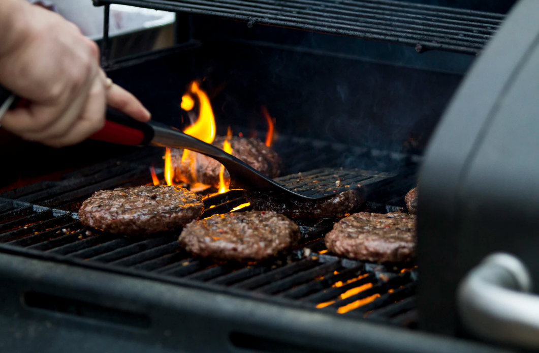 Photo of Burgers Being Grilled 